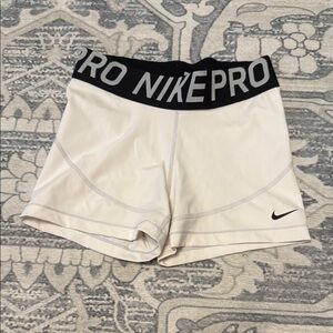 Nike White and Black Athletic Shorts with Compression Fit